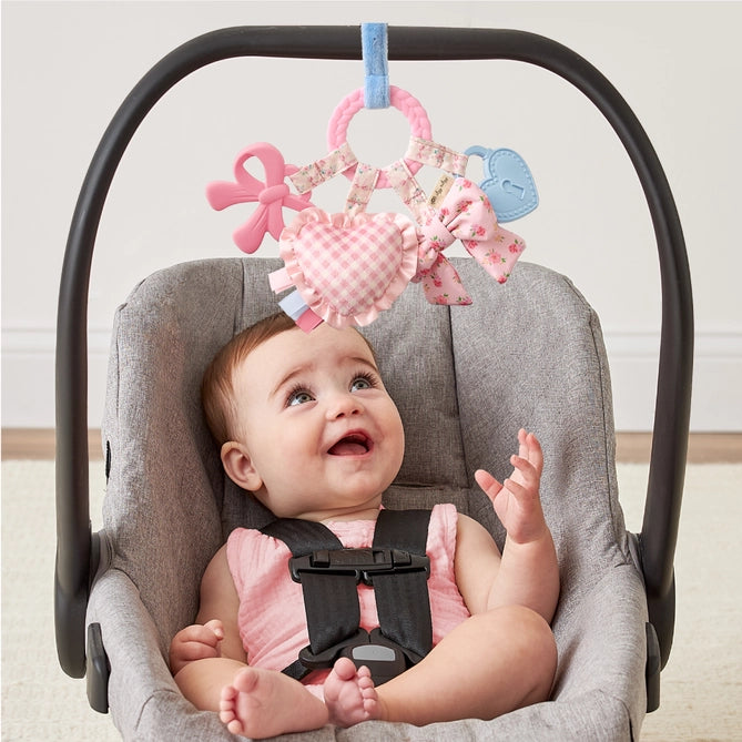 Bitzy Busy Ring™ Teething Activity Toy - Bow