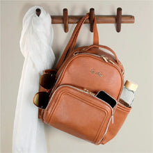 Load image into Gallery viewer, Cognac Itzy Mini Plus™ Backpack Diaper Bag
